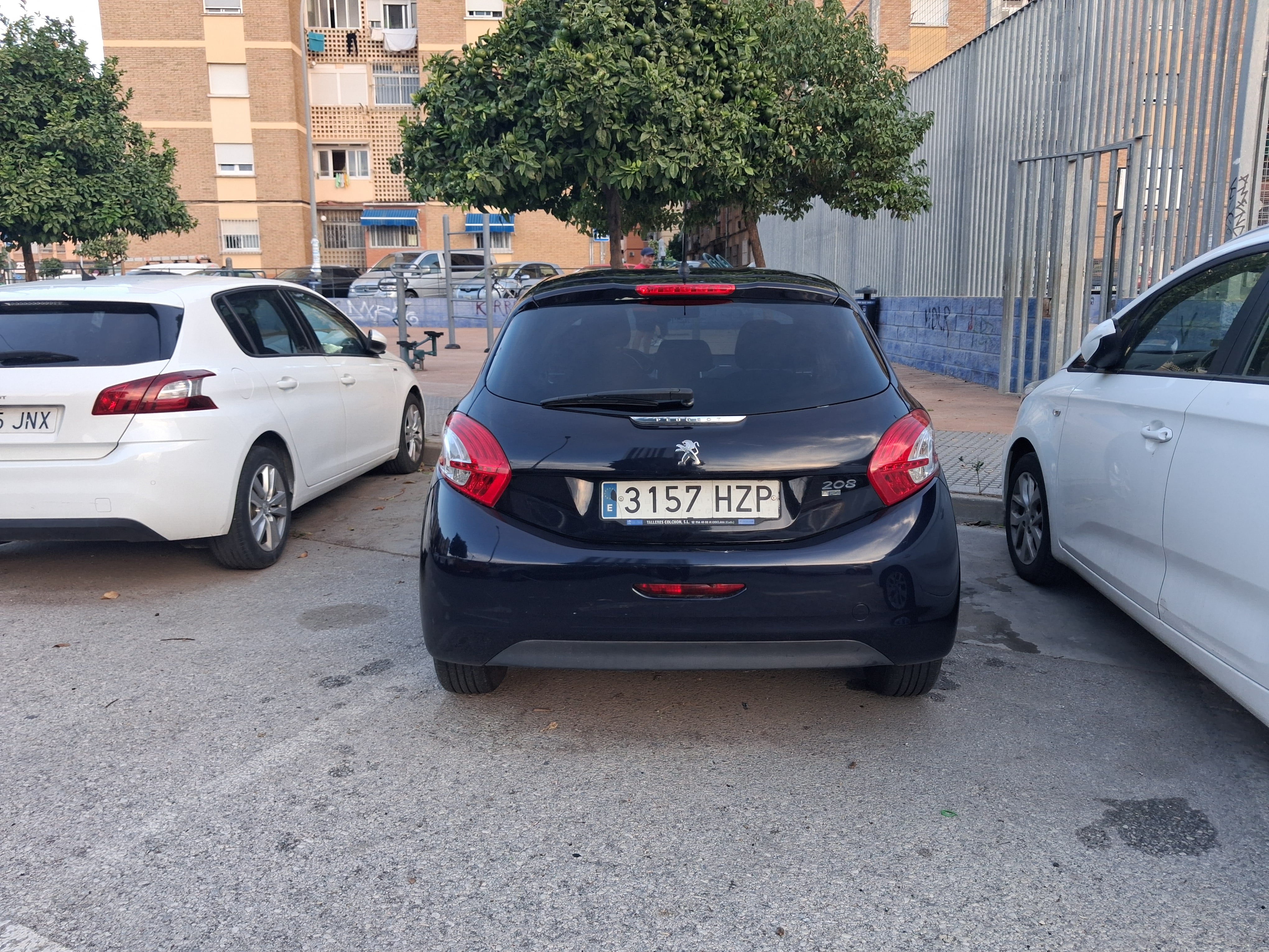 Peugeot 208 con Silla infantil