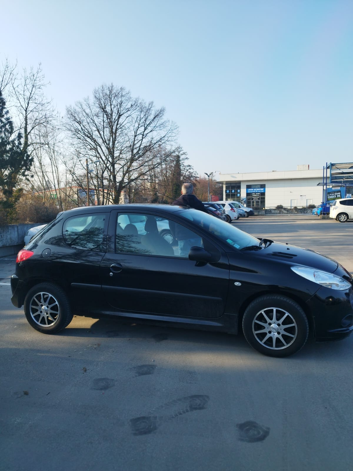 Peugeot 206+ avec Siège bébé