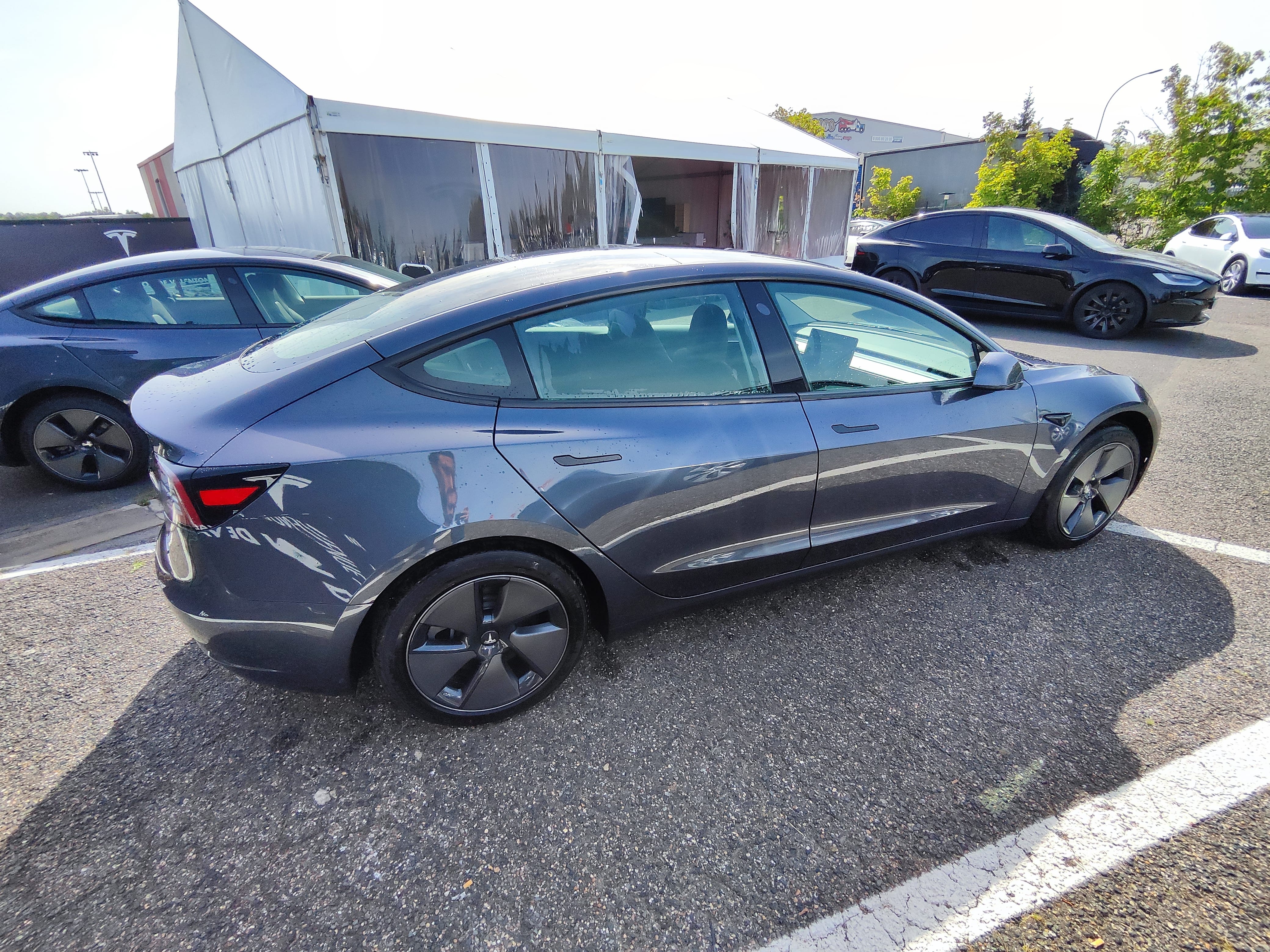 Tesla Model 3 Long Range Propulsion grande autonomie + 2 réhausseurs enfants avec Climatisation