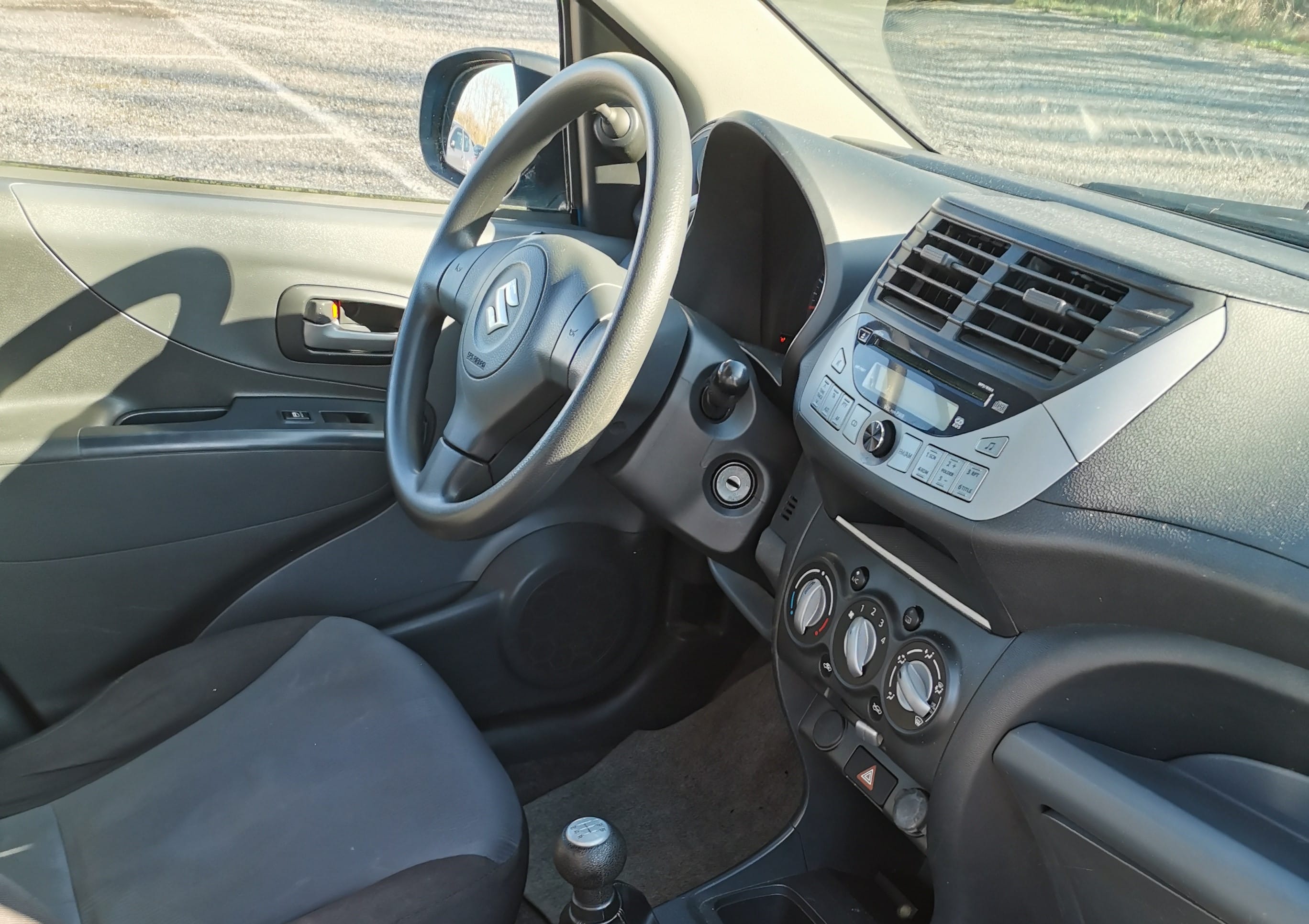 Suzuki Alto avec Siège bébé