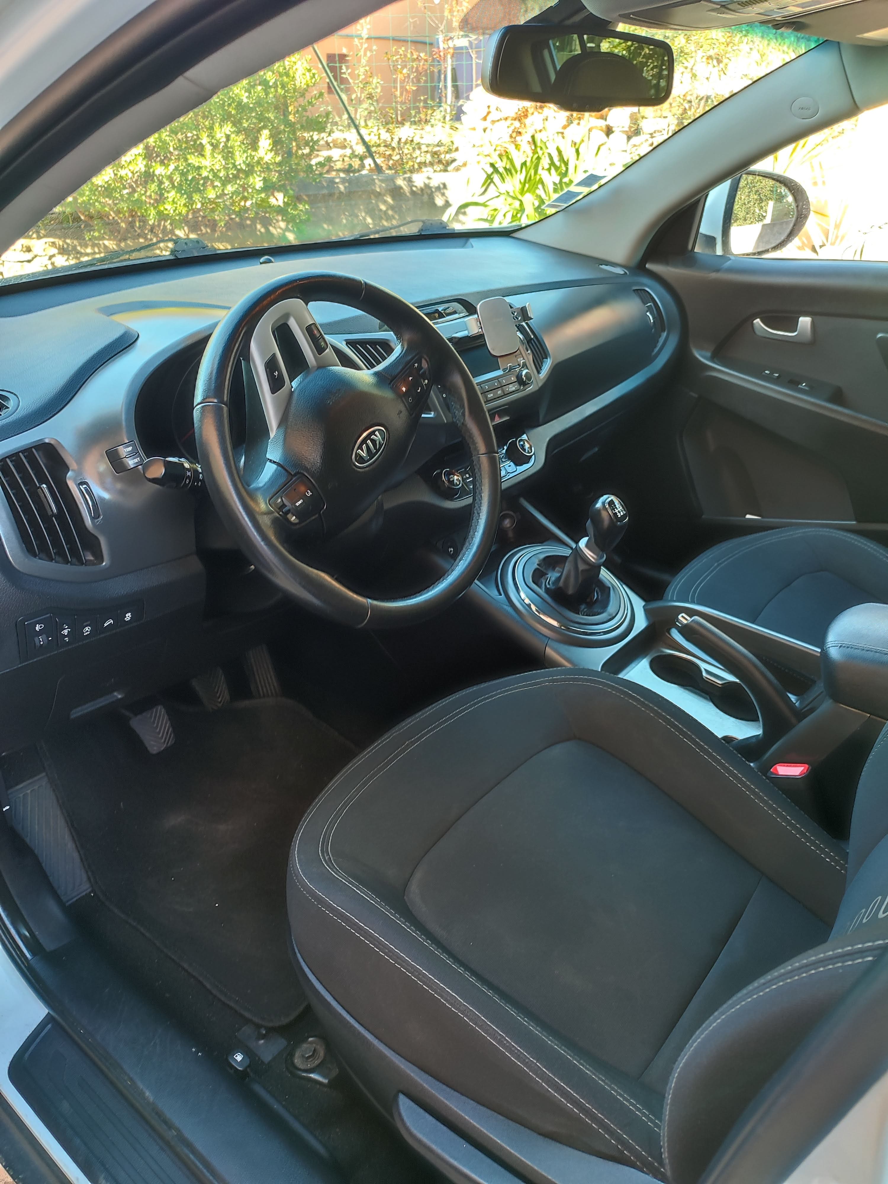 Kia Sportage avec Siège bébé