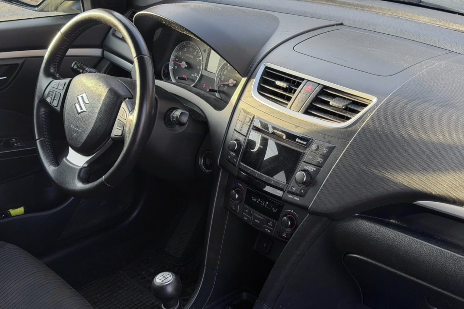 Suzuki Swift 4x4 mit Kindersitz
