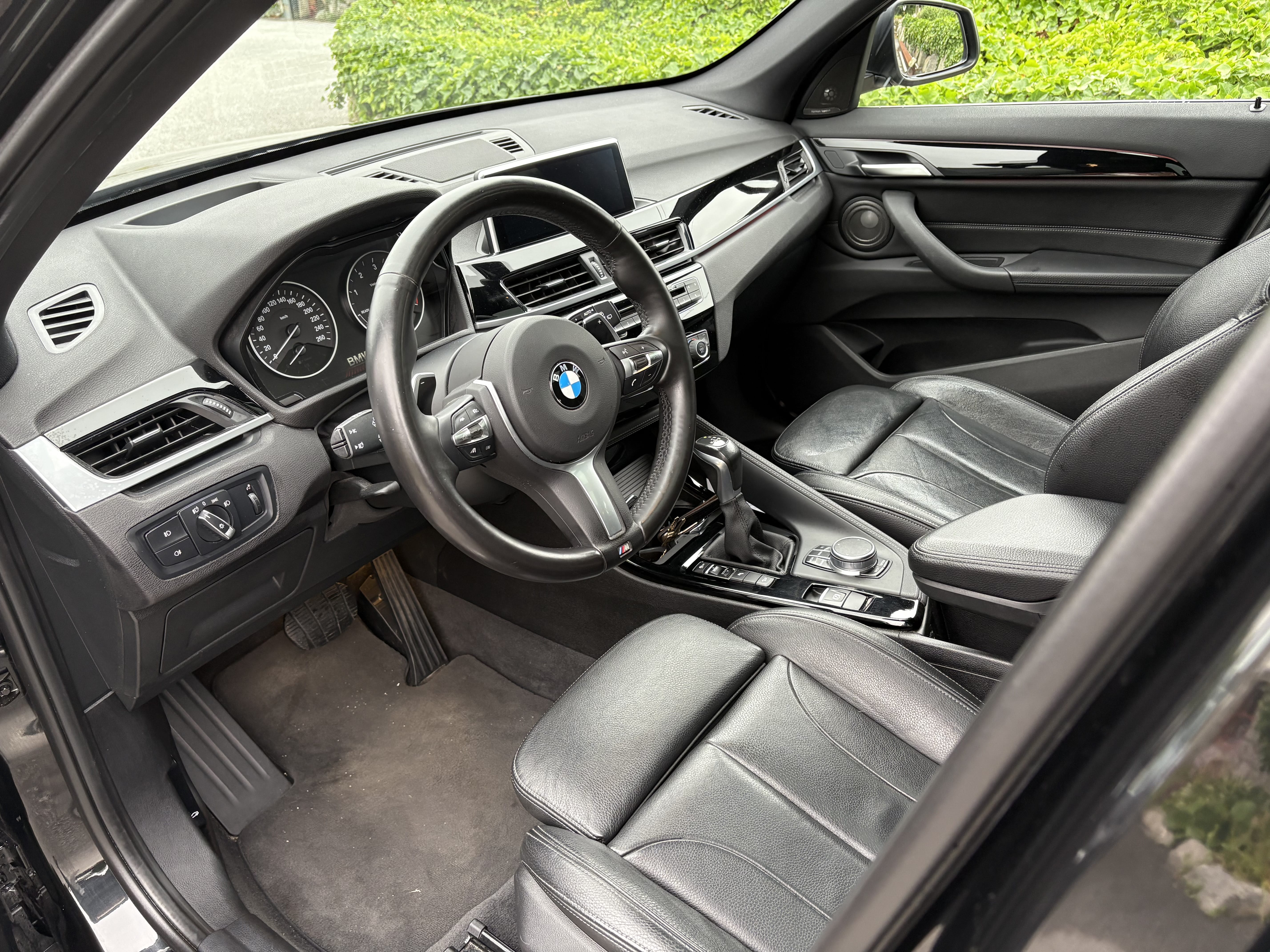 BMW X1 18d xDrive parkert i P-hus med Cruisekontroll