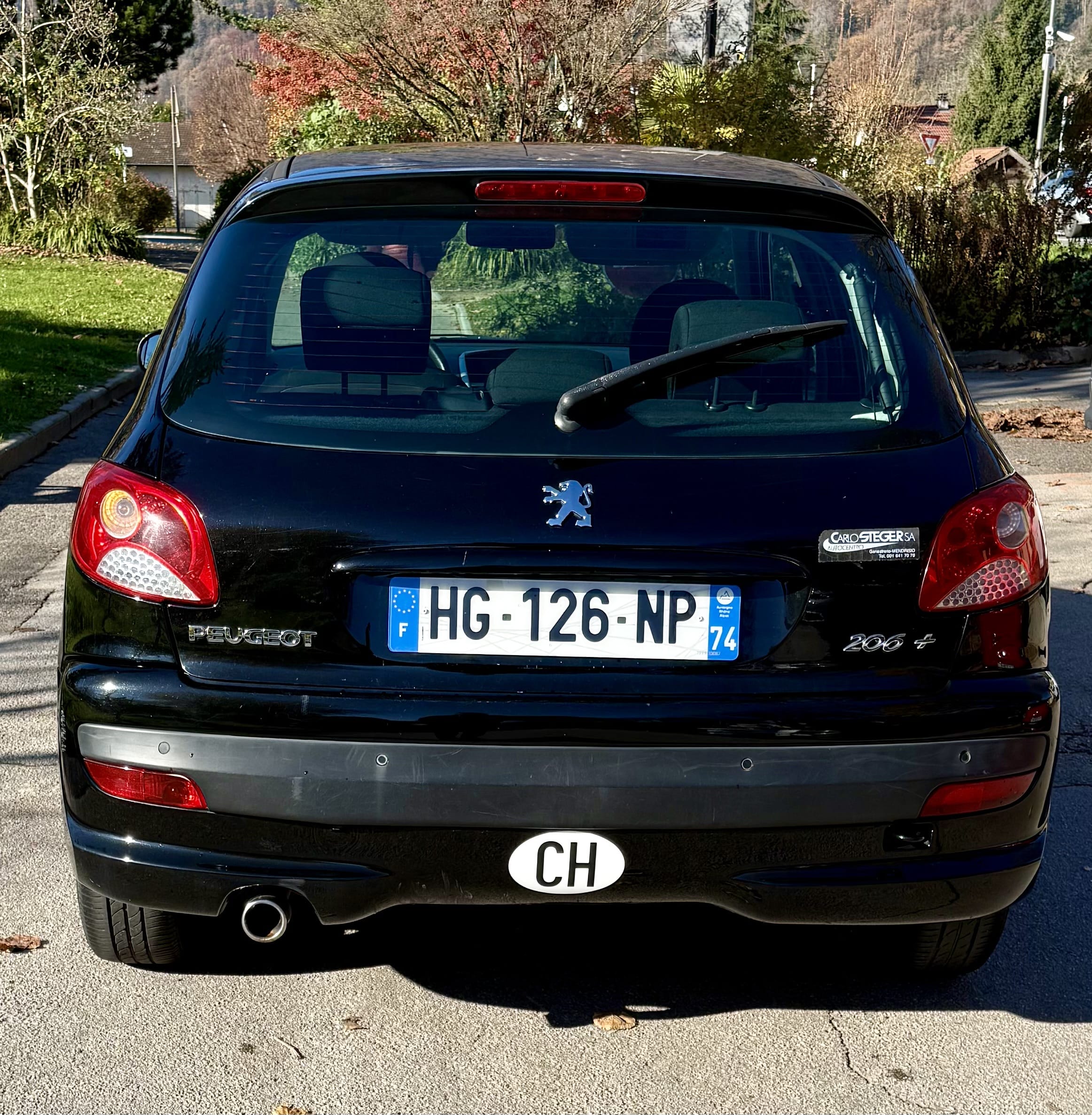 Peugeot 206+ avec Siège bébé