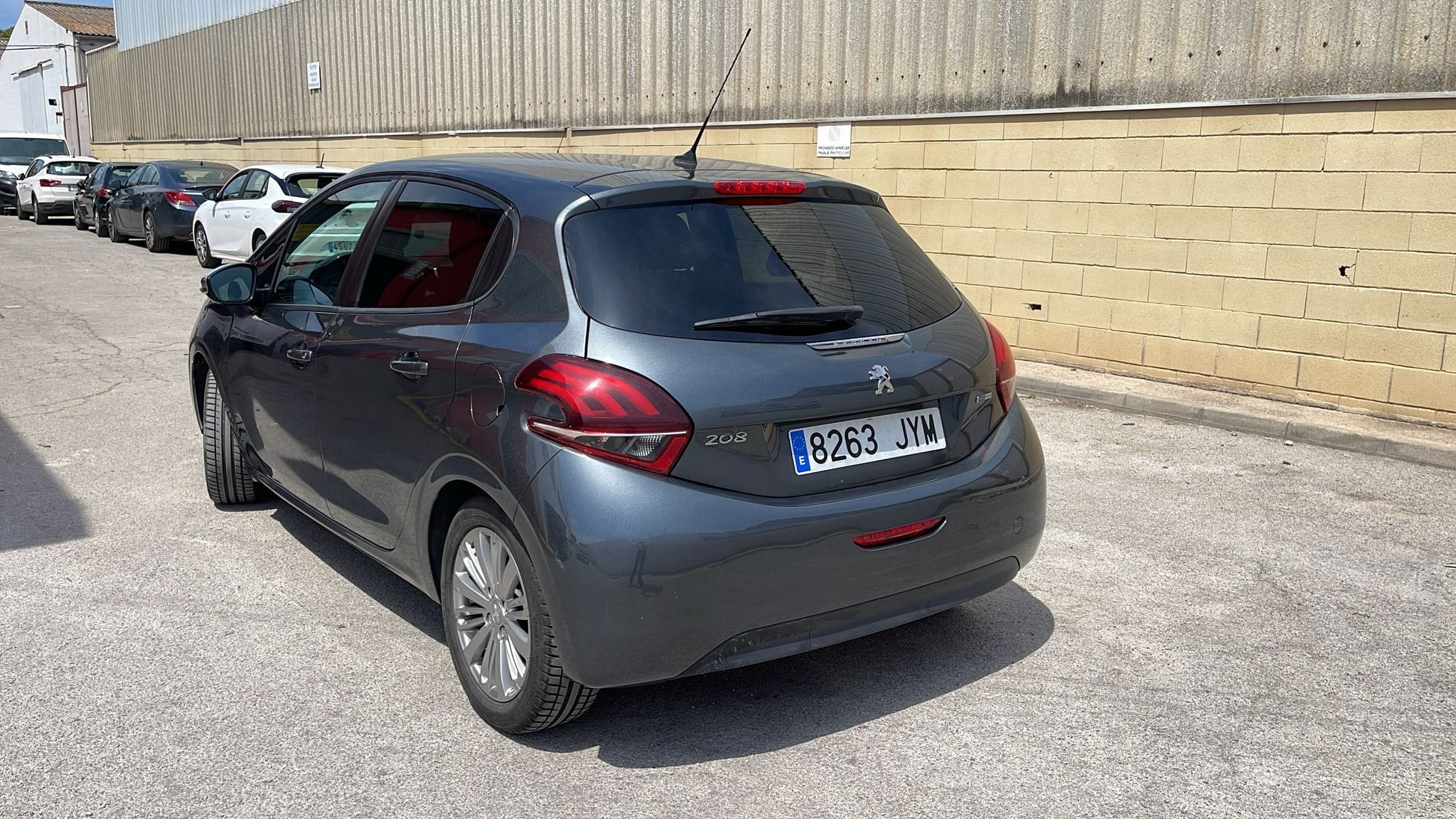 Peugeot 208 con Silla infantil
