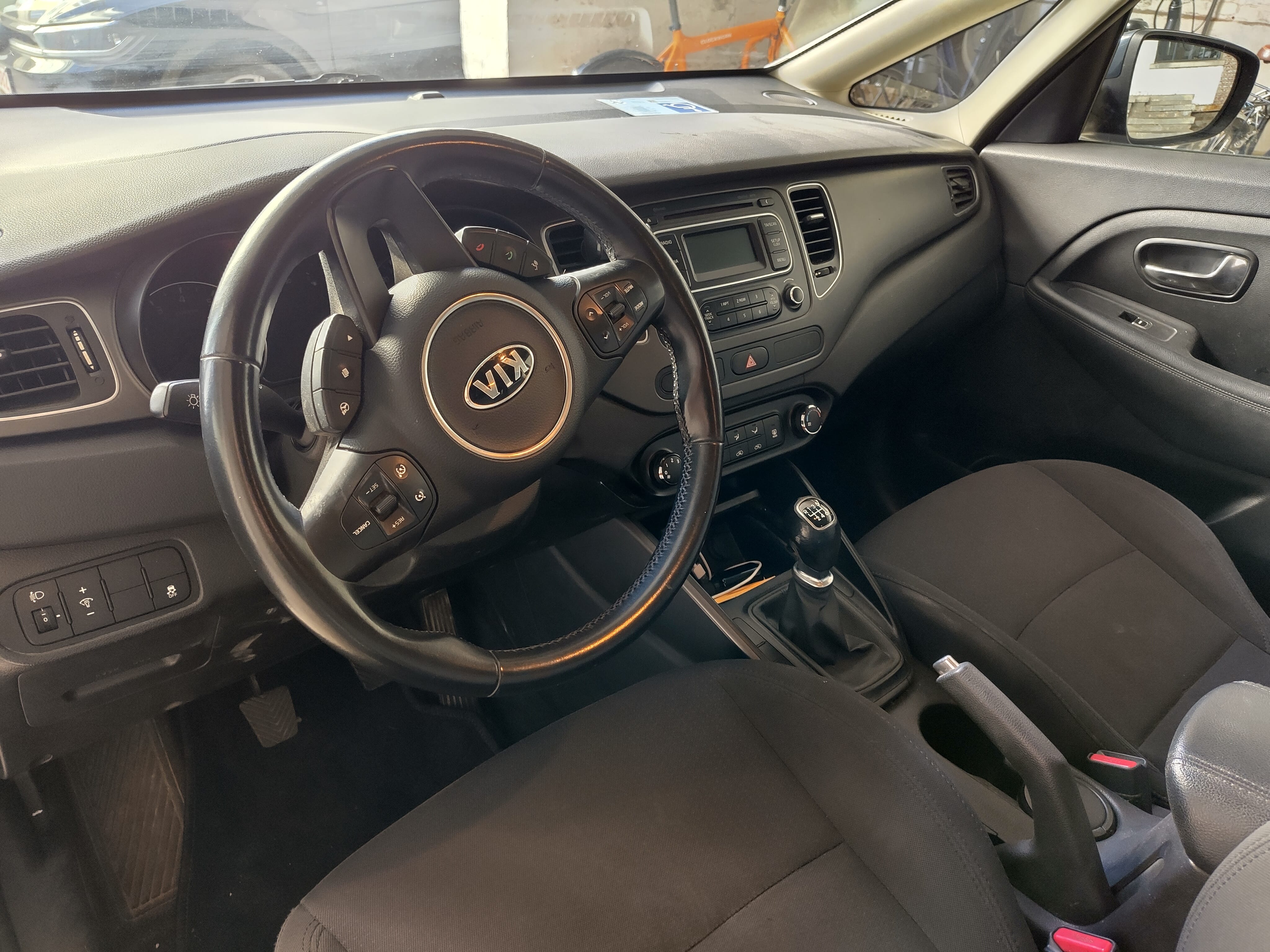 Kia Carens met Autostoel baby