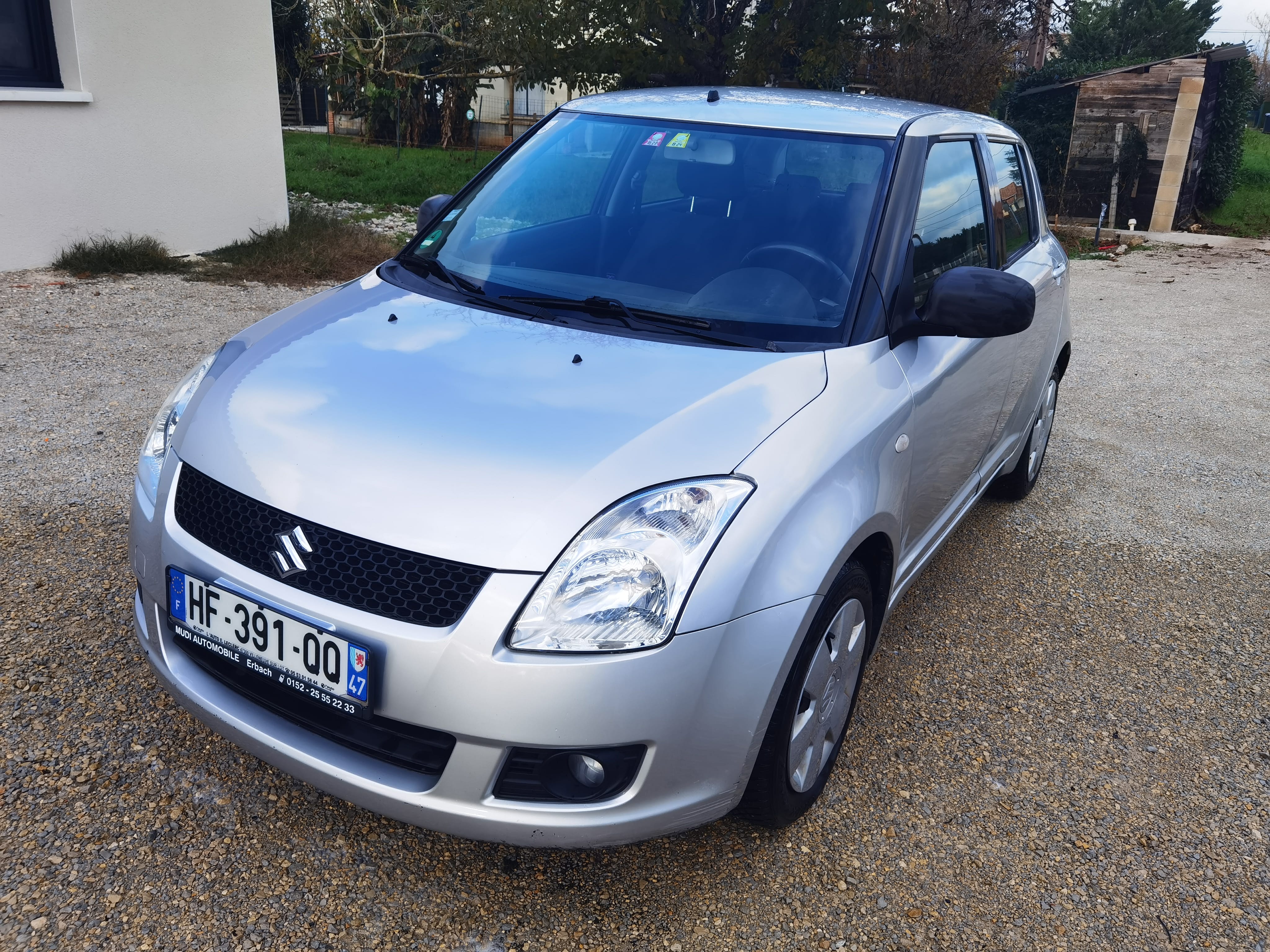 Suzuki Swift, 2011, Essence 95