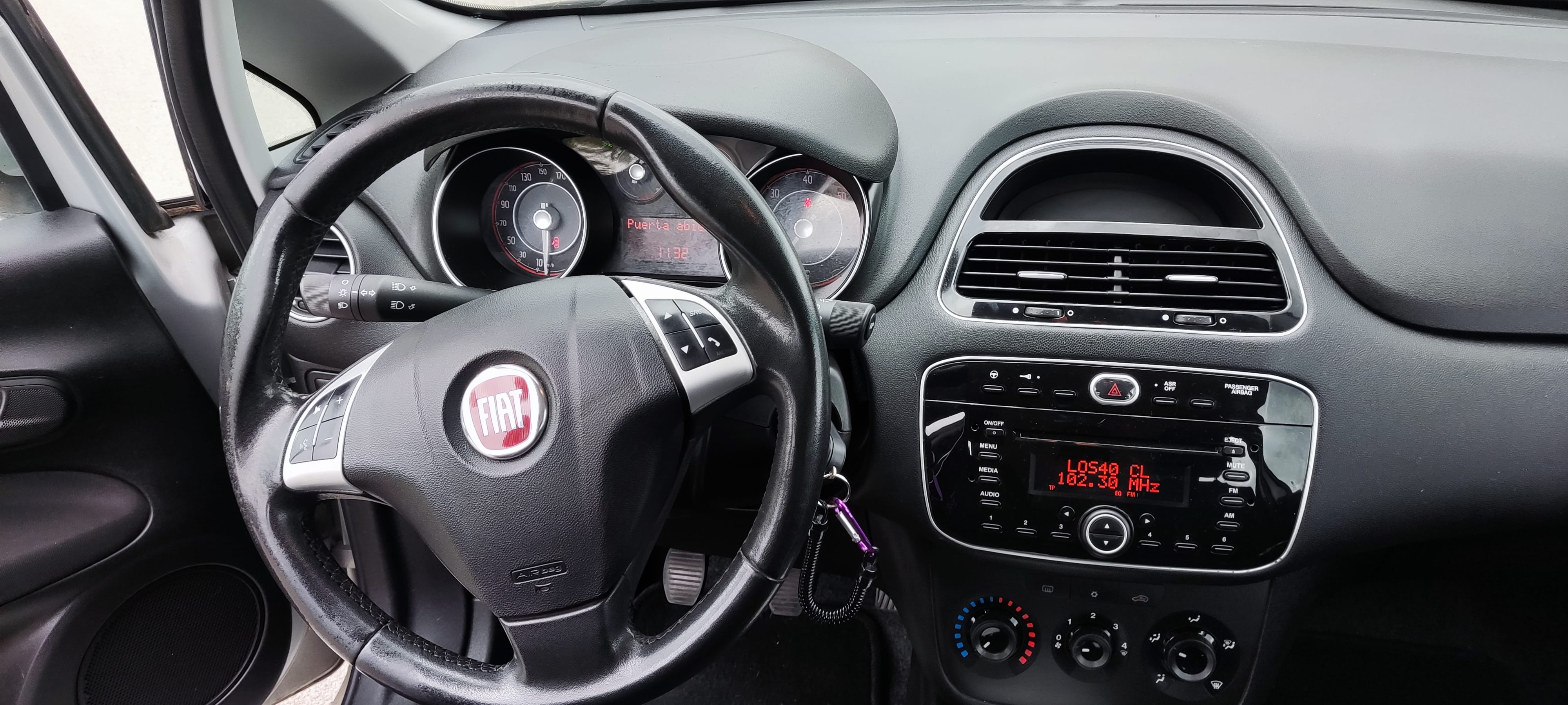 Fiat Grande Punto con Silla infantil