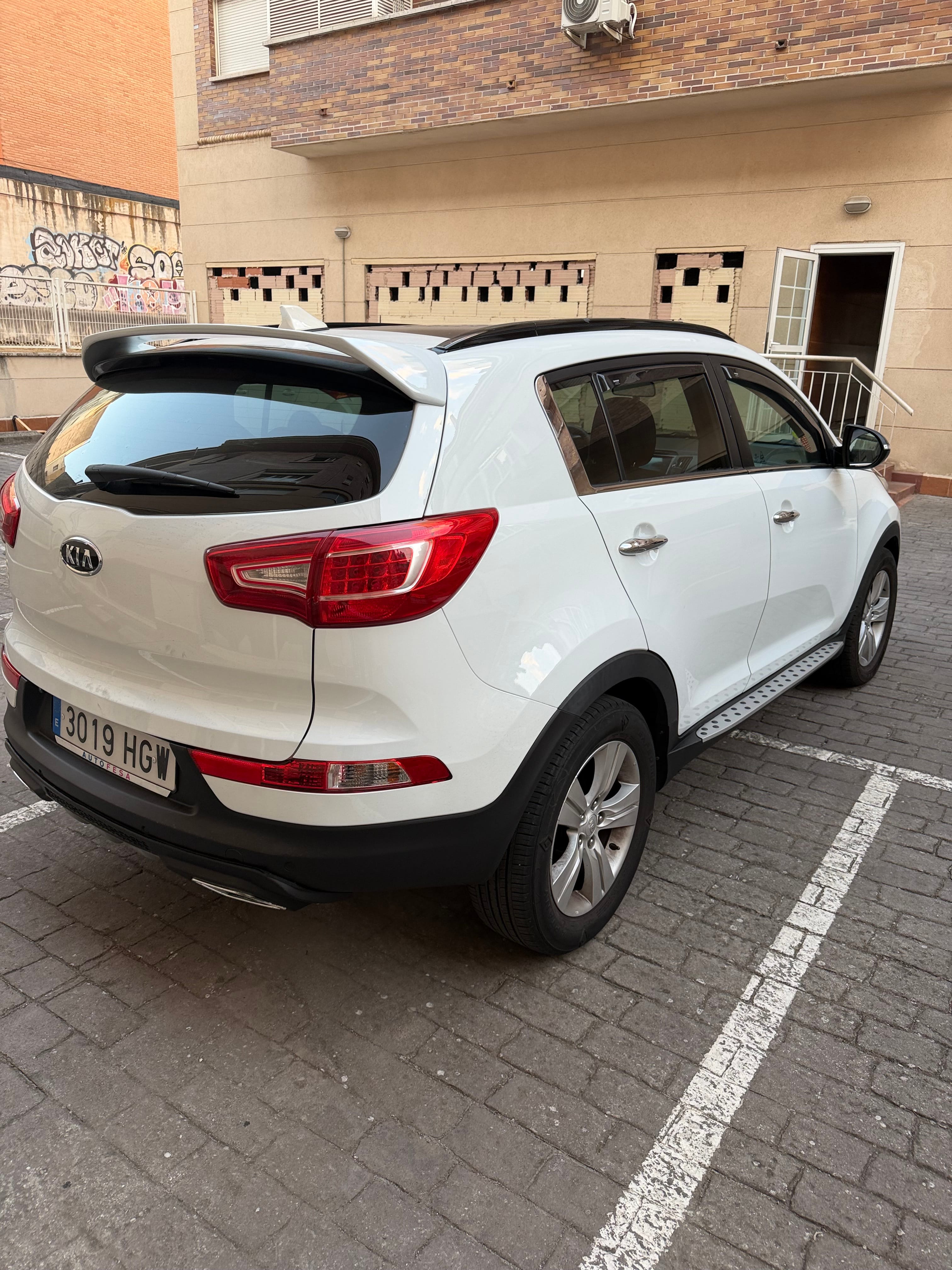 Kia Sportage con Silla infantil