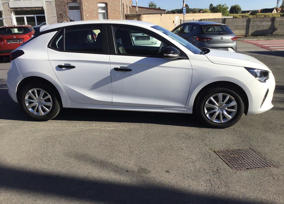 Opel Corsa 1.2i Edition, Airco (gare du Midi) met Airco