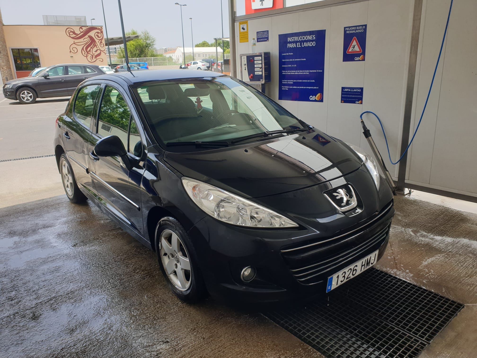 Peugeot 207 con Silla infantil