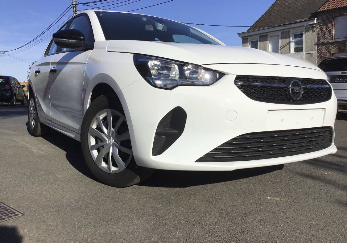 Opel Corsa 1.2i Edition, Airco (gare du Midi) met Cruise control