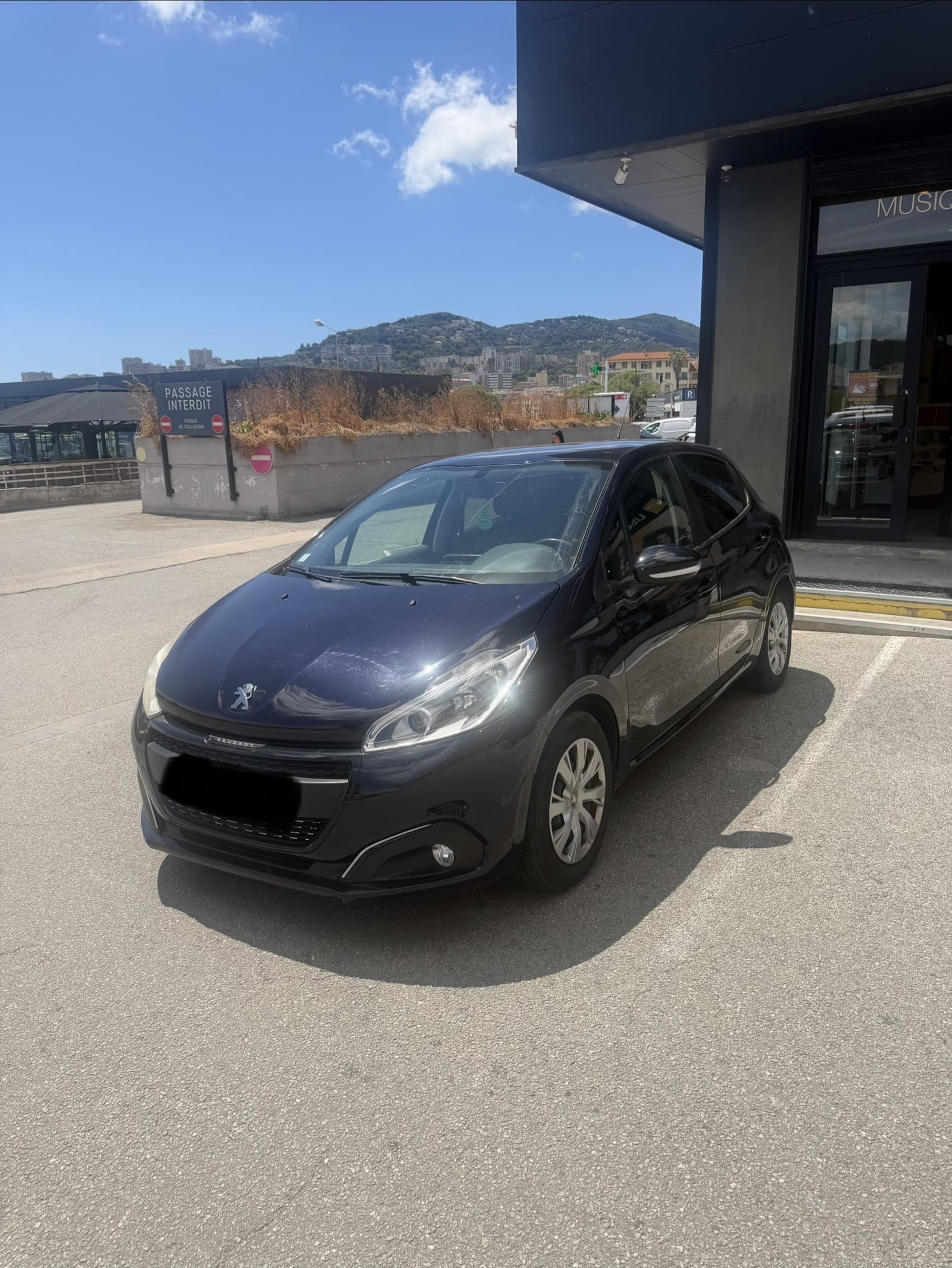 Peugeot 208 avec Siège bébé