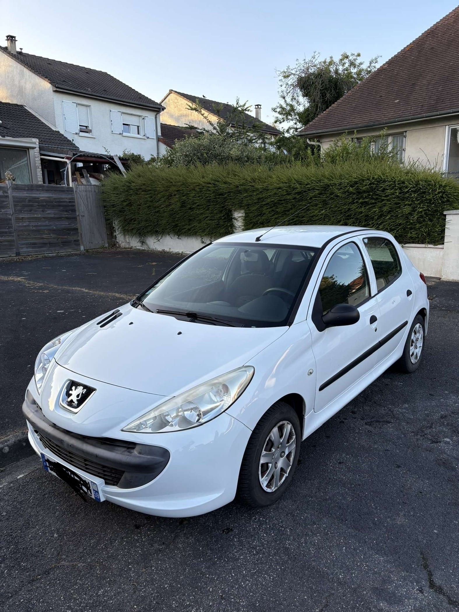 Peugeot 206+ avec Siège bébé