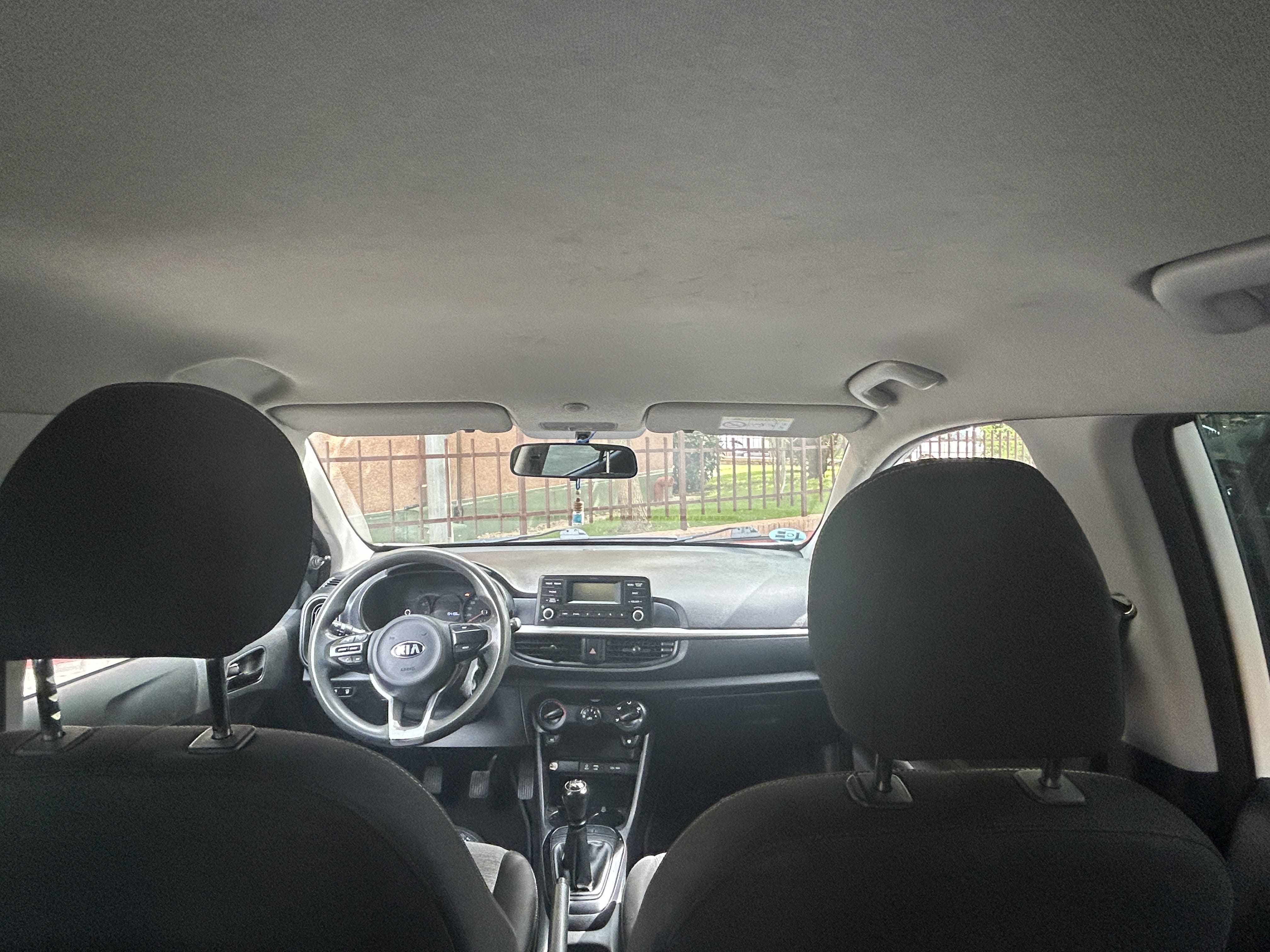 Kia Picanto con Silla infantil