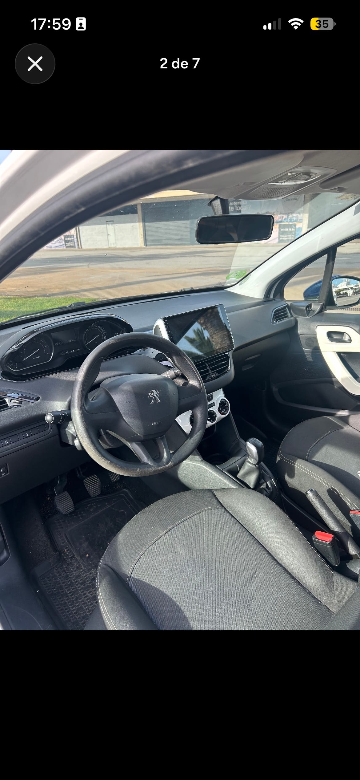 Peugeot 208 con Silla infantil