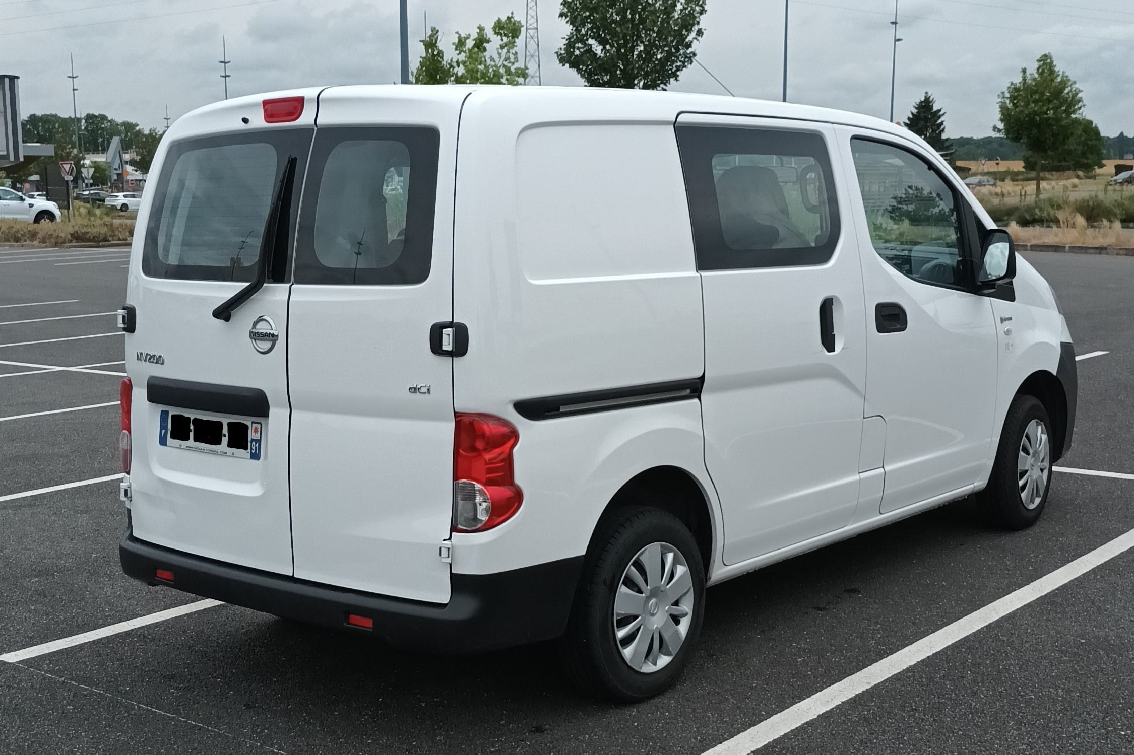 Nissan NV200 avec Chaines