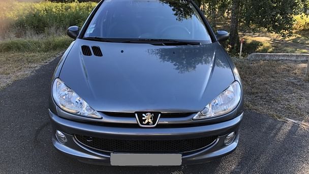 Peugeot 206 SW 16S avec Siège bébé