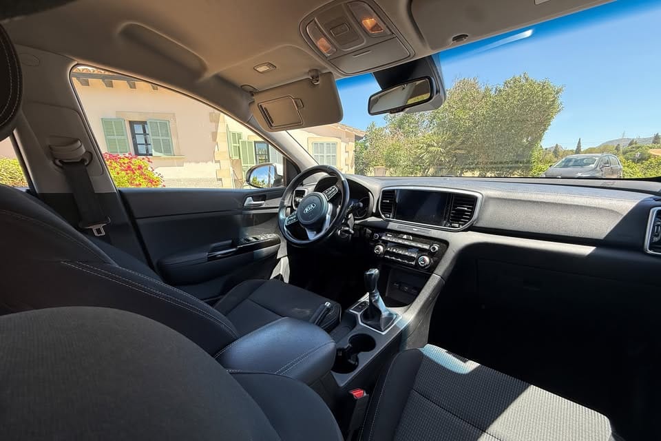 Kia Sportage Híbrido con Silla infantil