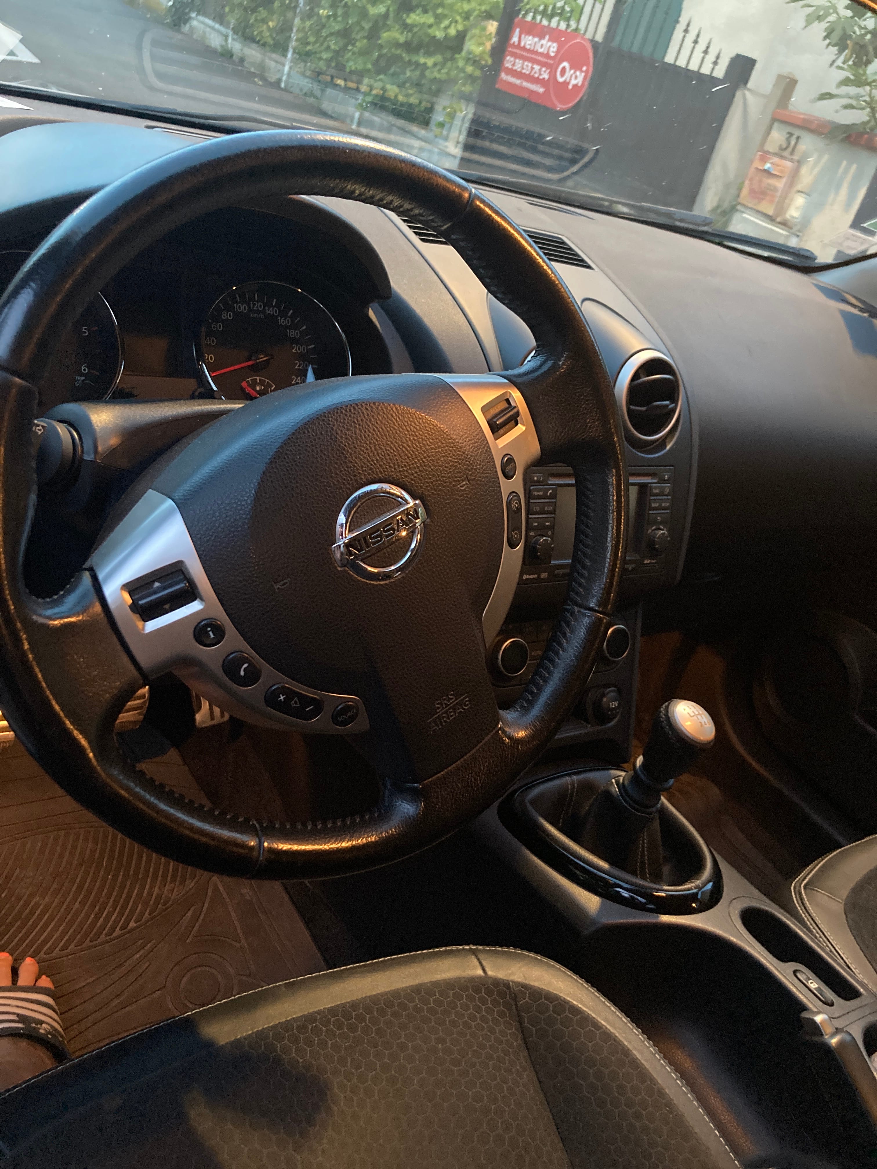 Nissan Qashqai avec Siège bébé