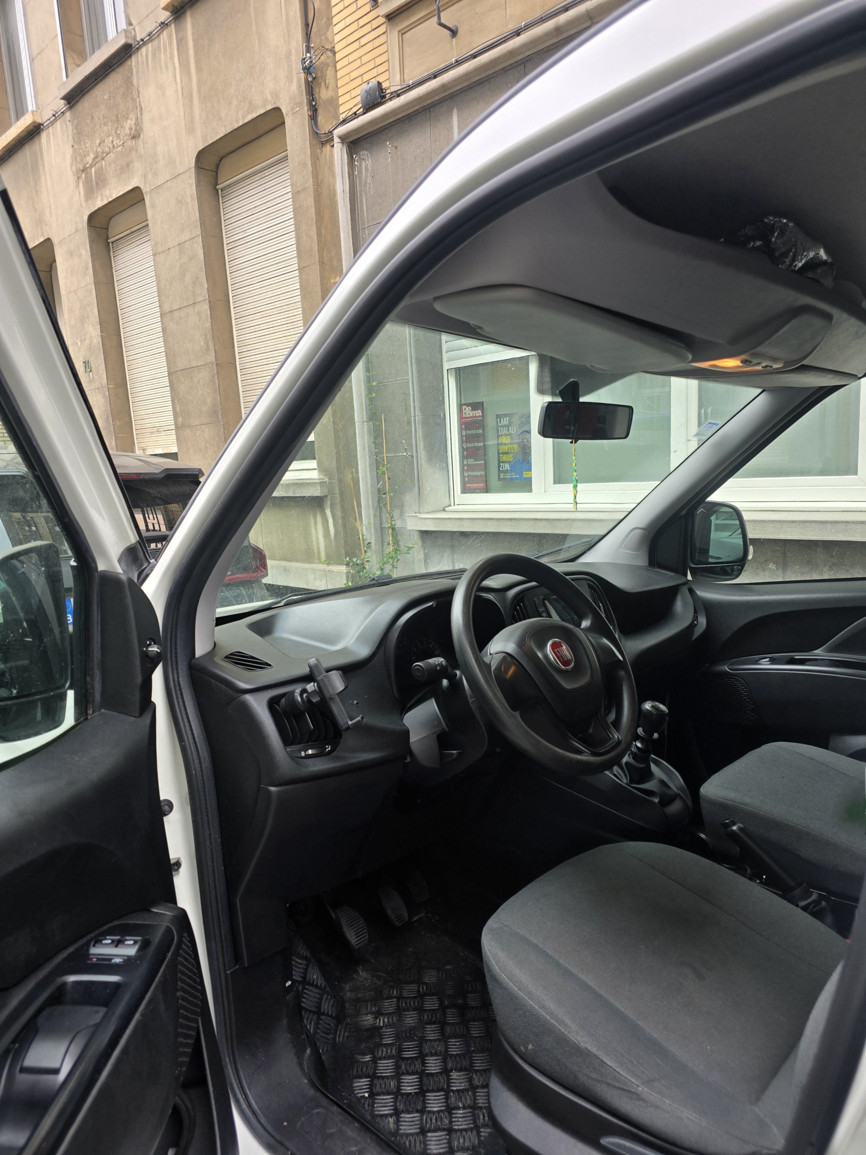 Fiat Doblo Cargo met Autostoel baby
