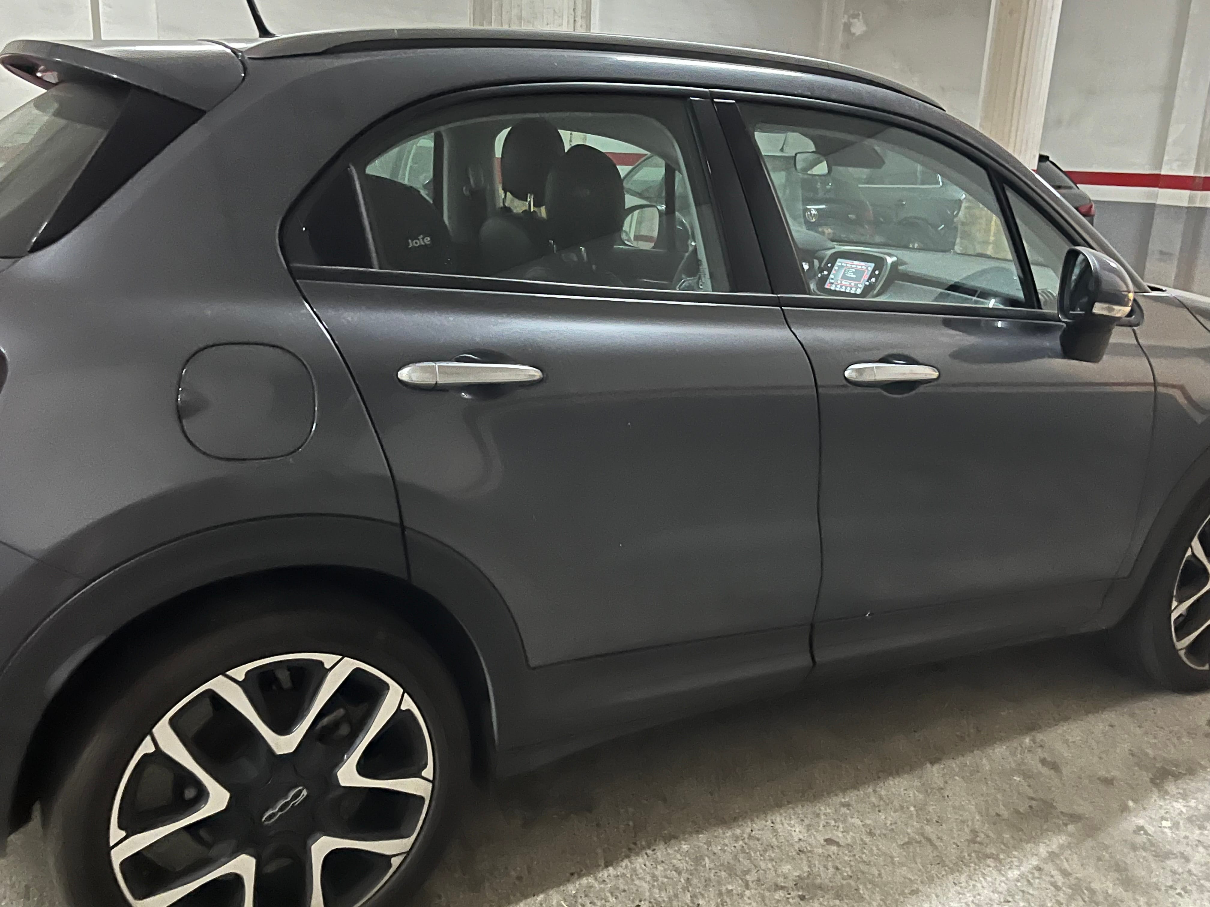 Fiat 500 X con Silla infantil