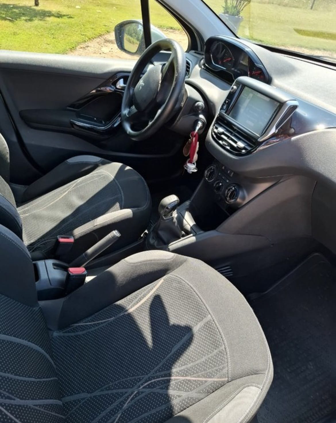 Peugeot 208 avec Siège bébé