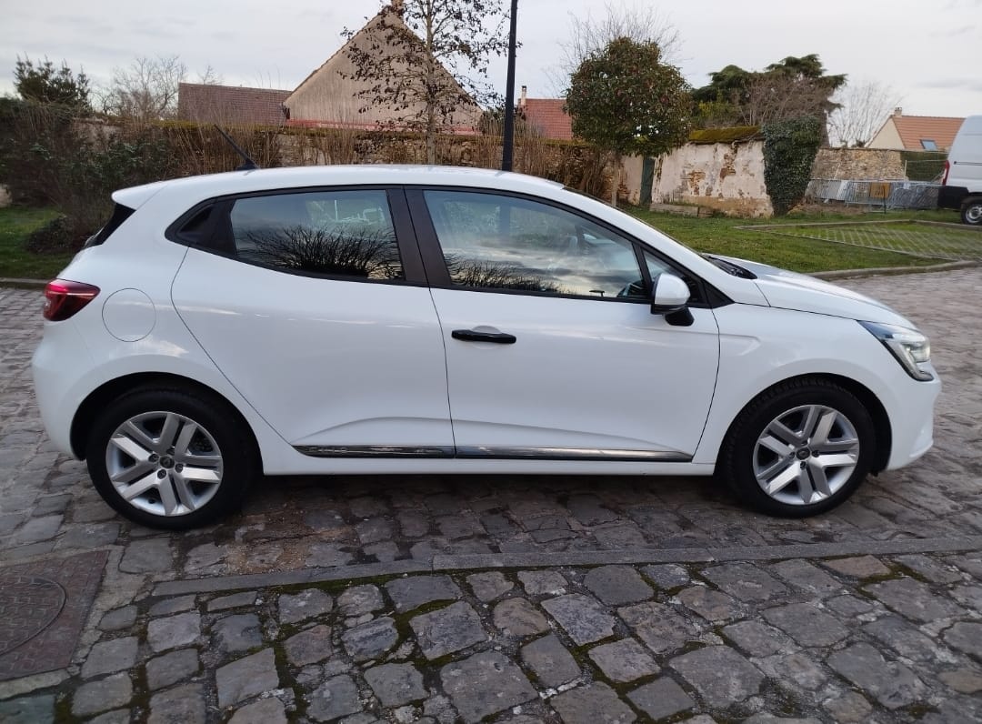 Renault Clio + Options Coffre de toit + siège enfant avec Climatisation