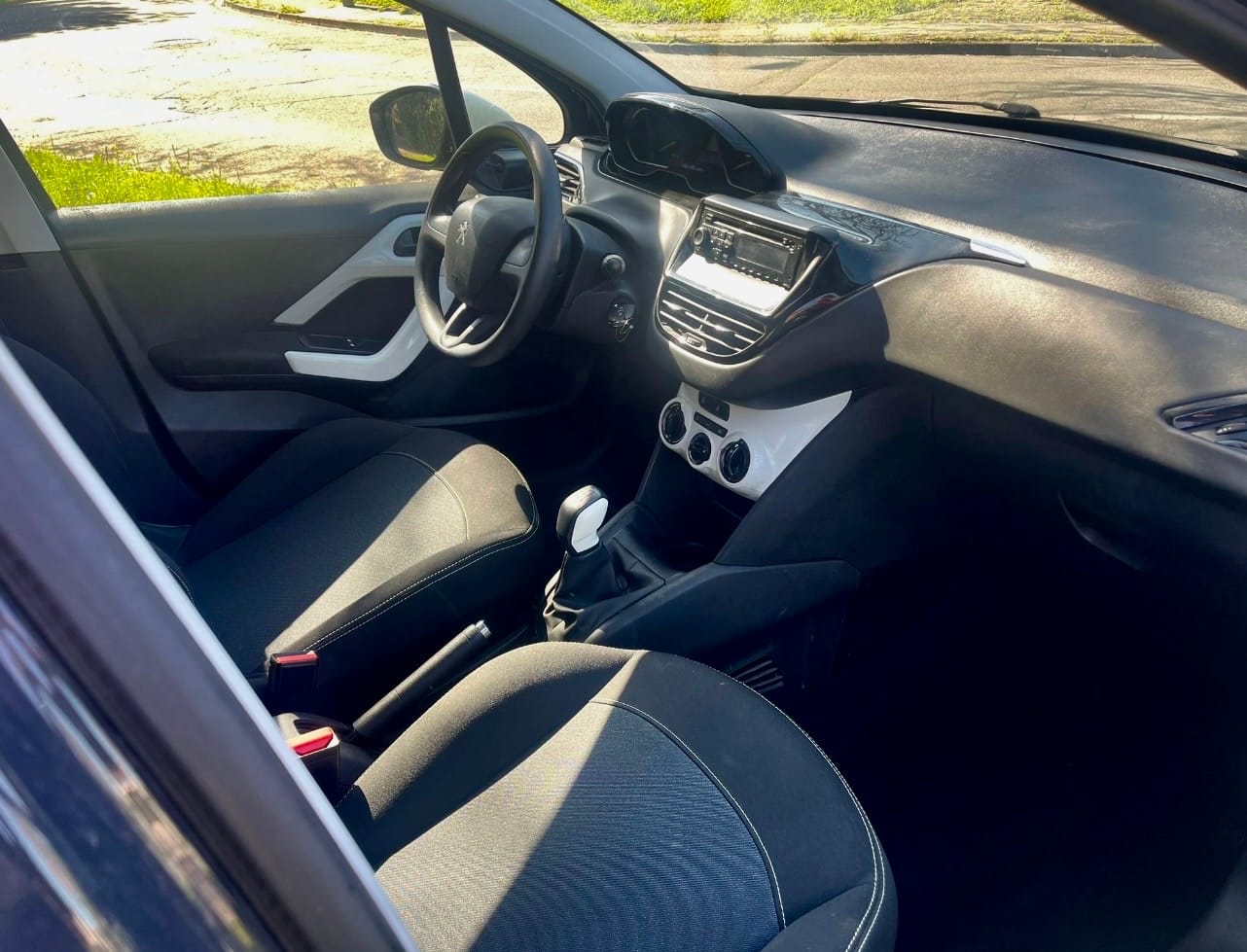 Peugeot 208 avec Siège bébé