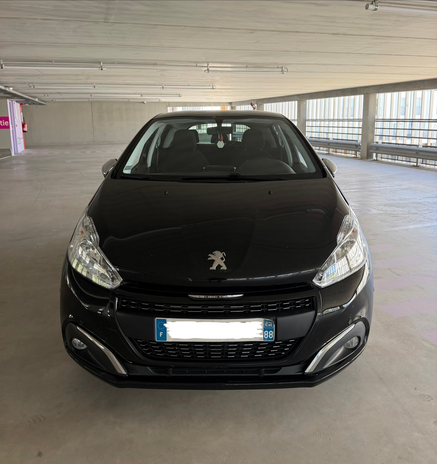 Peugeot 208 avec Siège bébé