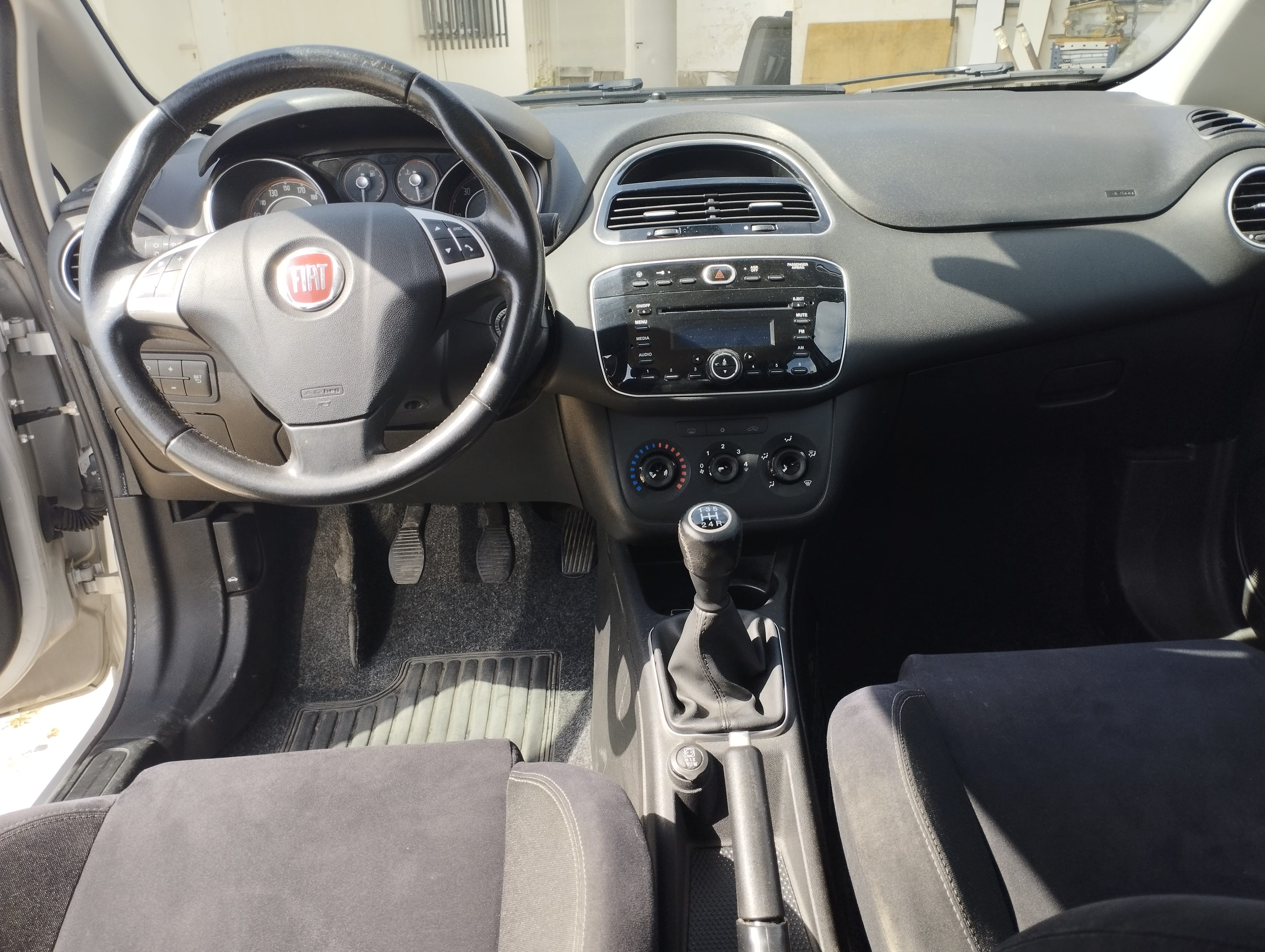 Fiat Punto 1.3 con Silla infantil