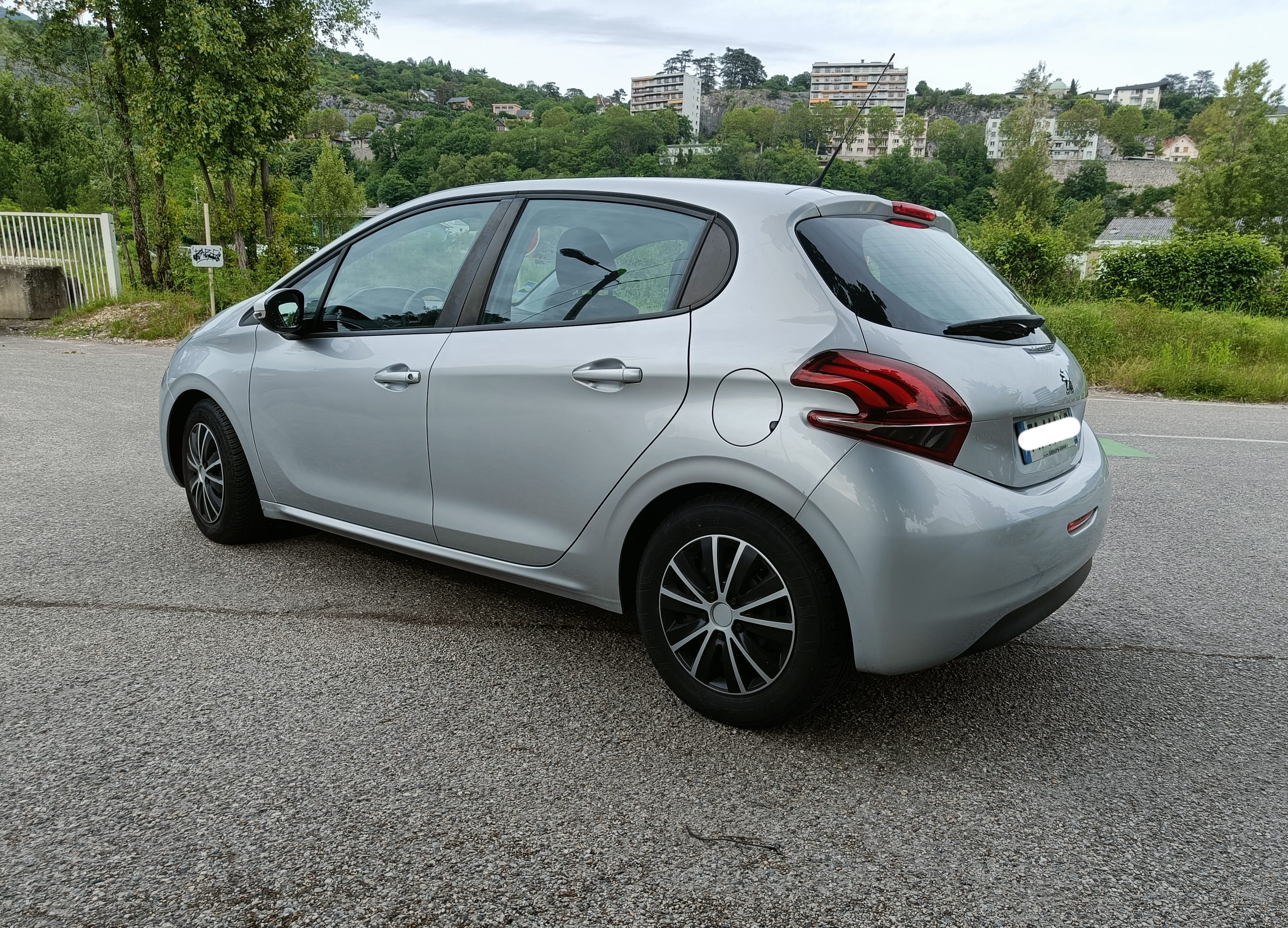 Peugeot 208 avec Siège bébé