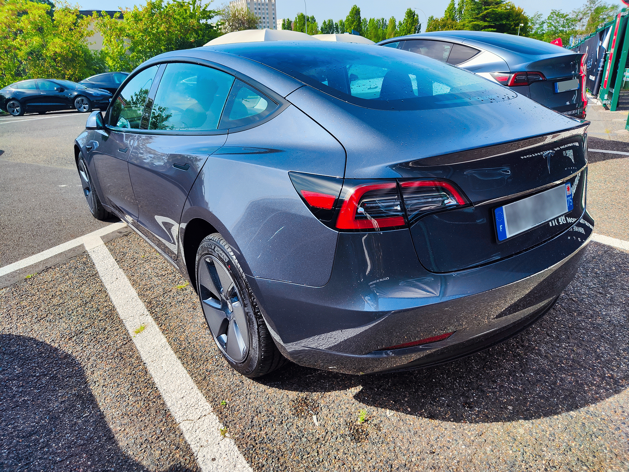 Tesla Model 3 Long Range Propulsion grande autonomie + 2 réhausseurs enfants avec GPS