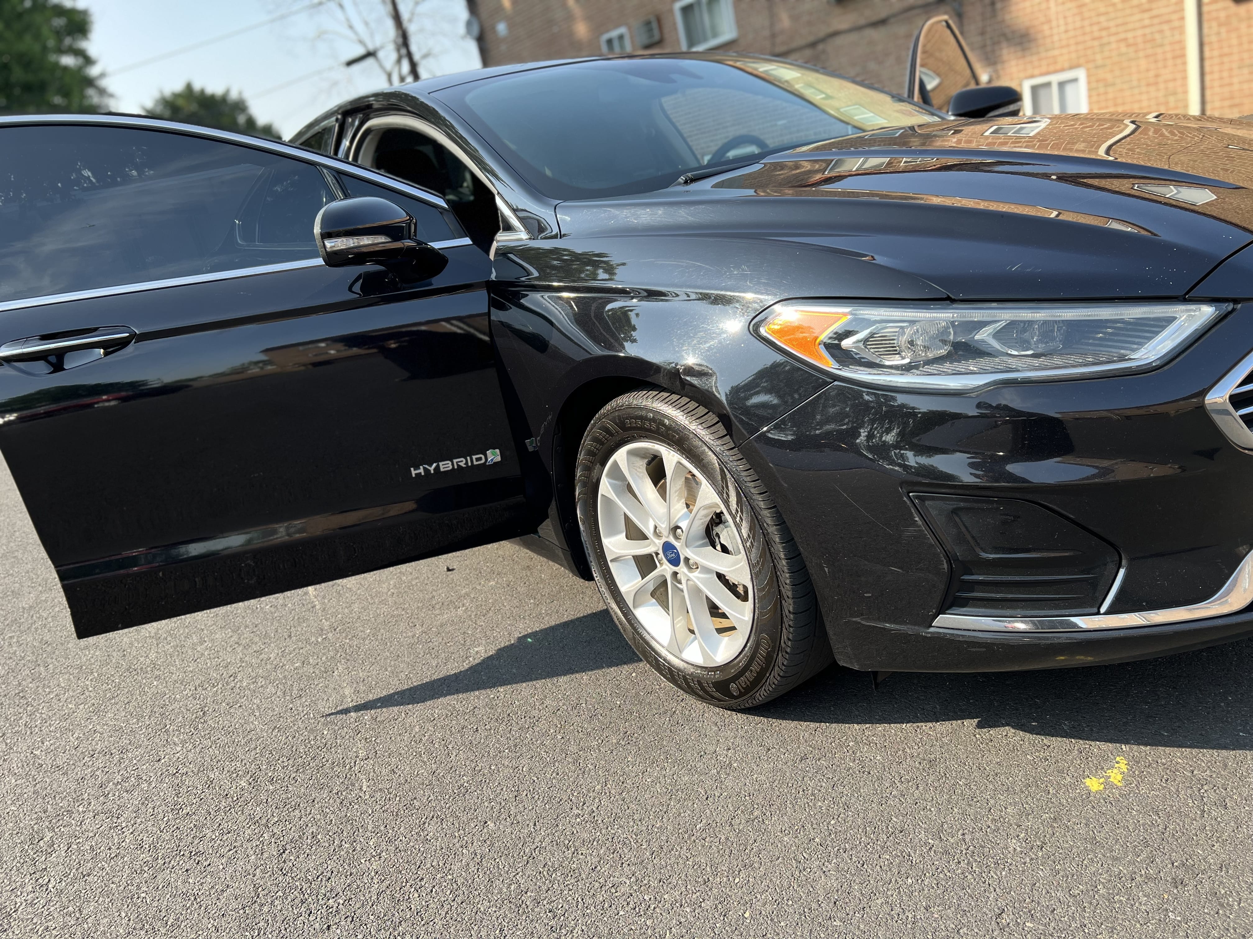 Ford Fusion Hybrid SEL with Cruise control